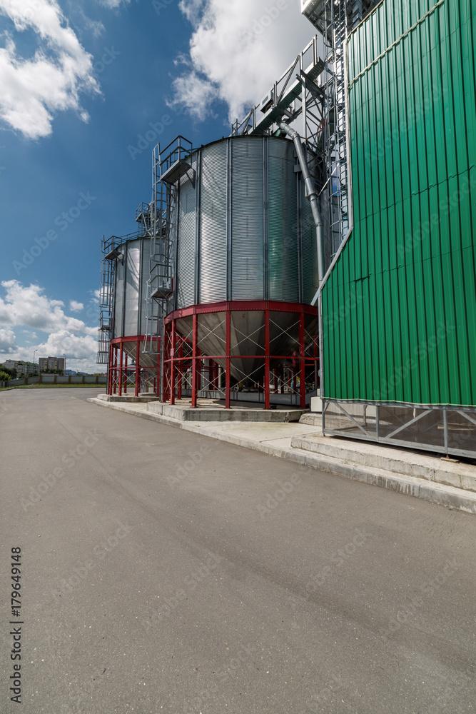 Modern large granary. Large metal silos.