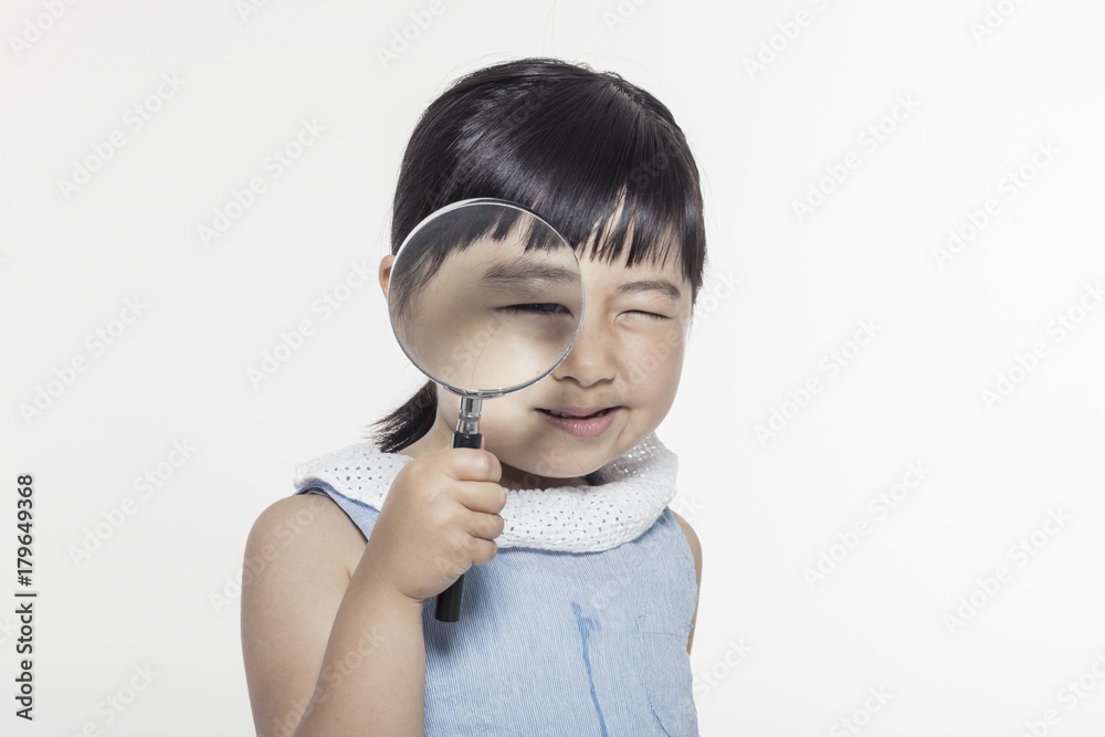 pretty girl hand hold a magnifier isolated white.
