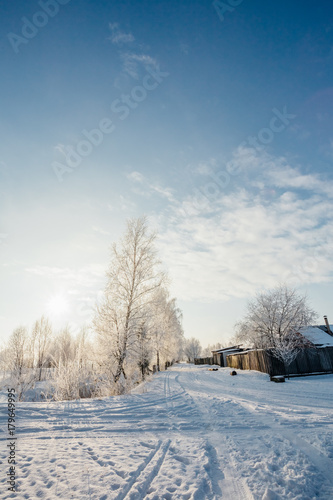 Outskirts of the village in the snow in winter