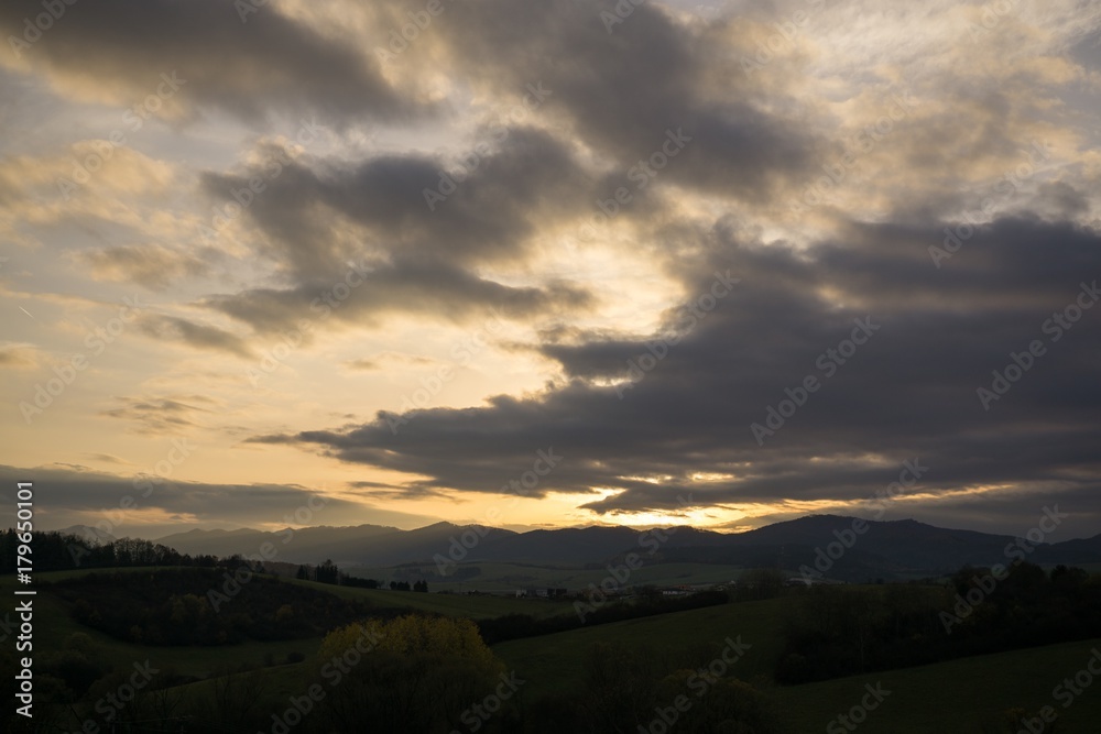 Sunset and sunrise with dramatic colorful clouds. Slovakia Sunset and sunrise with dramatic colorful clouds. Slovakia