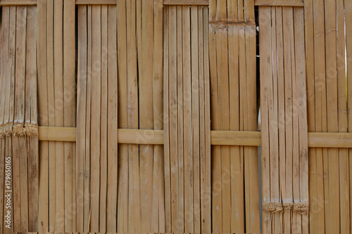 texture of old  brown bamboo stripe wall © Onnada