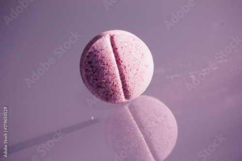 Pink purple tablet pills