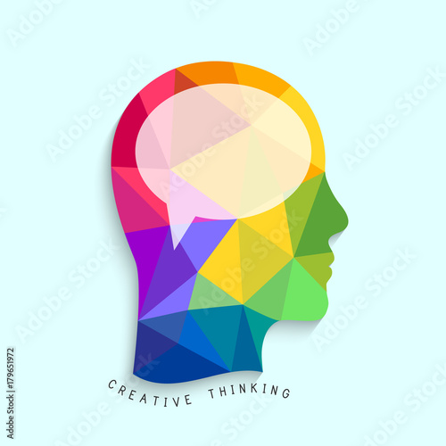 Creative thinking concept with colorful head silhouette made in low poly design 
