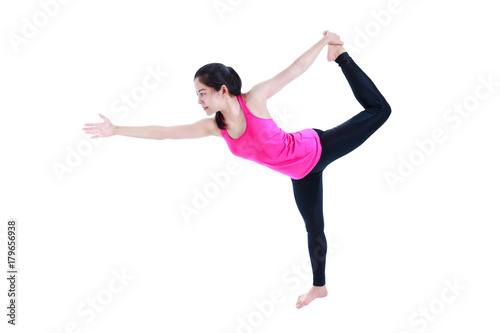 Woman doing yoga in standing half bow pose or Utthita Ardha Dhanurasana pose.
