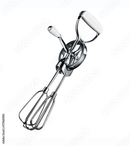 Картината върху платно Egg beater isolated on white background with clipping path.