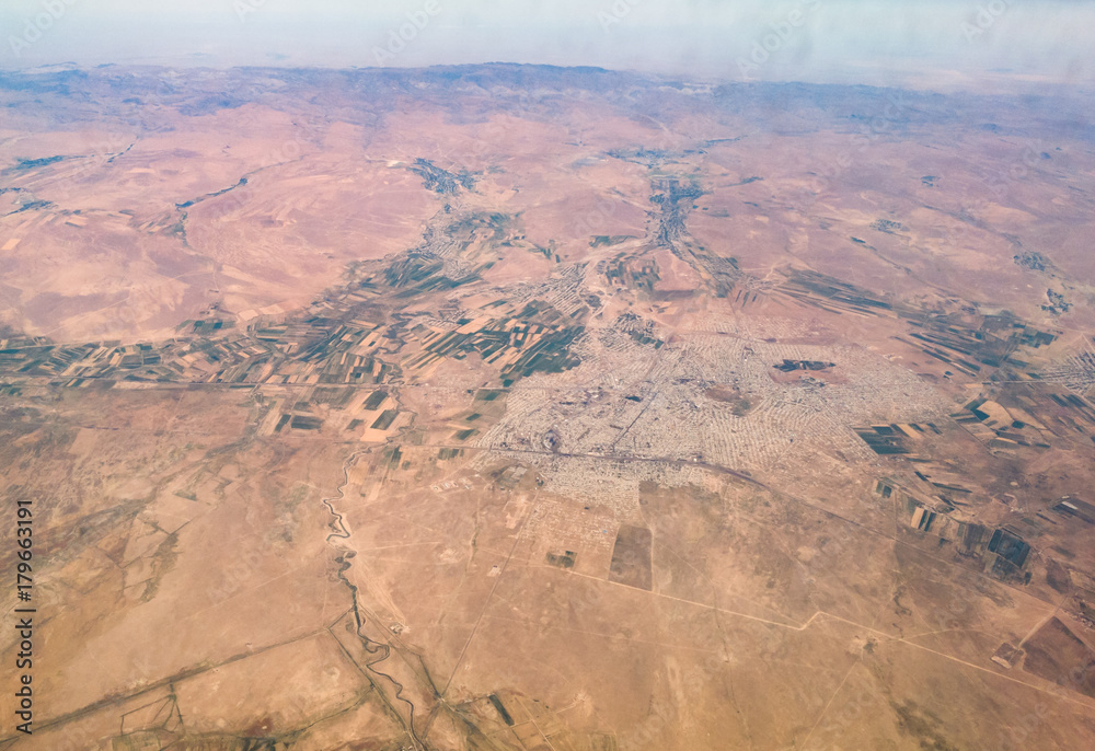 surface of the earth from the airplane window surface of the earth from the airplane window