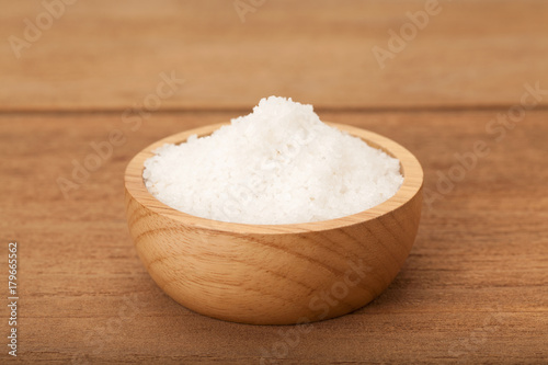 Sea salt in wooden bowl