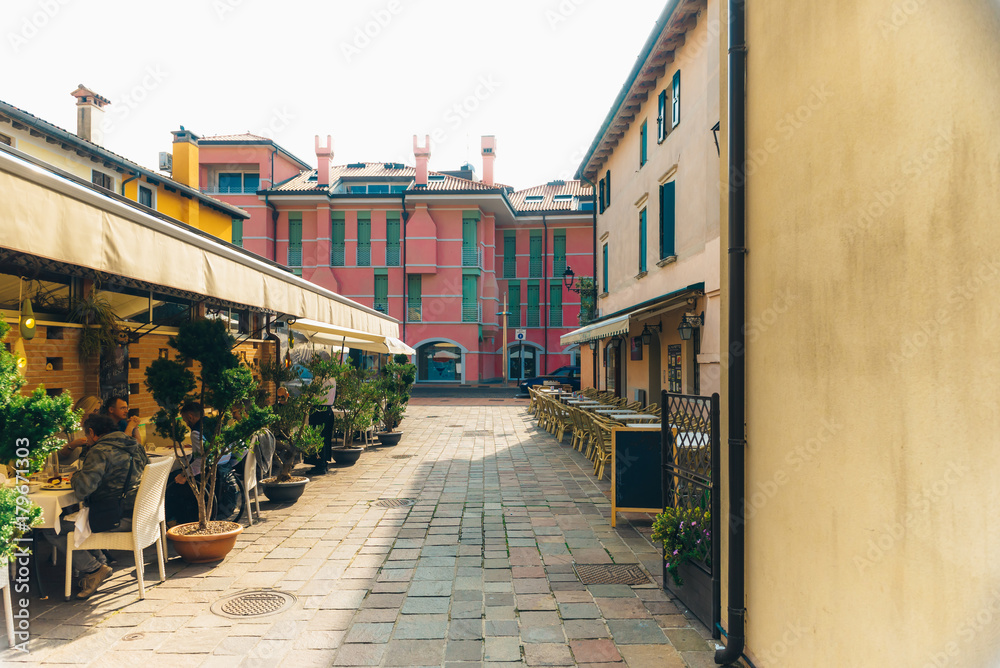 Obraz premium Tourist district of the old provincial town of Caorle in Italy