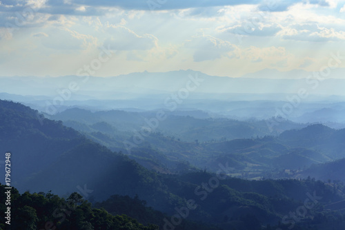 Beautiful scenery of mountains with light sunrays in the evening , Tak province , Thailand