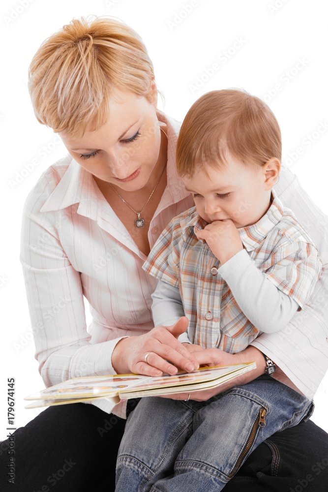 Mother and baby embracing , reading book Mother and baby embracing , reading book