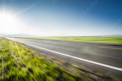 road in grassland,moution blur