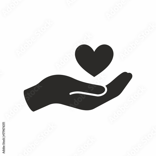 Heart in hand icon photo