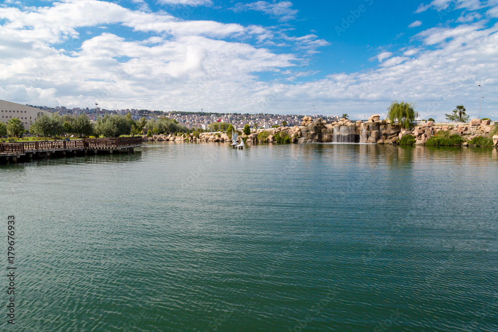 Artificial Lake on Cloudy Background