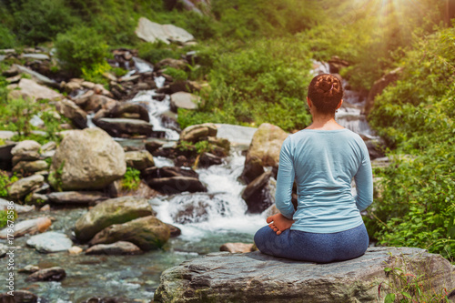 Yoga outdoors - Padmasana asana lotus pose