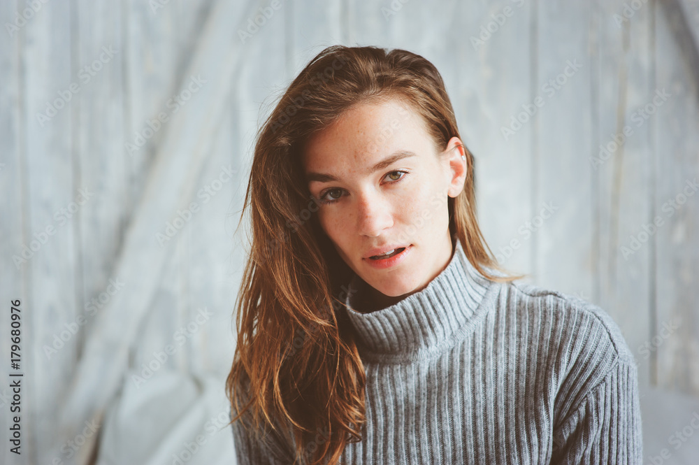 portrait of young woman relaxing at home in weekend morning, drinking coffee in bed portrait of young woman relaxing at home in weekend morning, drinking coffee in bed