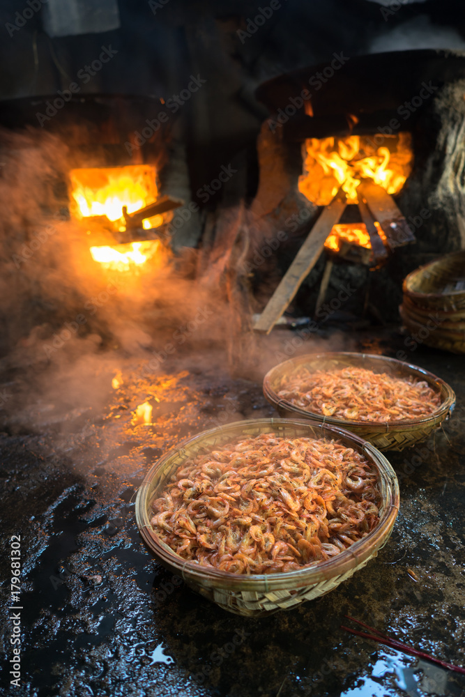 Boiled shrimp baskets. Seafood processing at fish market in Quy Nhon, south Vietnam Boiled shrimp baskets. Seafood processing at fish market in Quy Nhon, south Vietnam