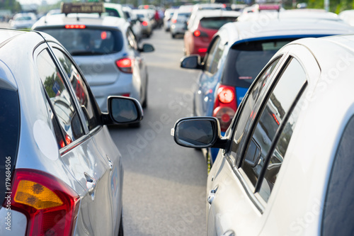 Cars on urban street in traffic jam