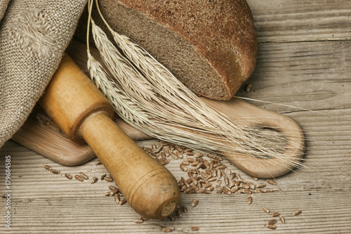 rye bread, and corn on a wooden table