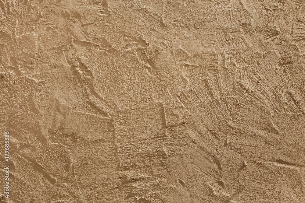 Fototapeta premium Beige painted stucco wall. Background texture.