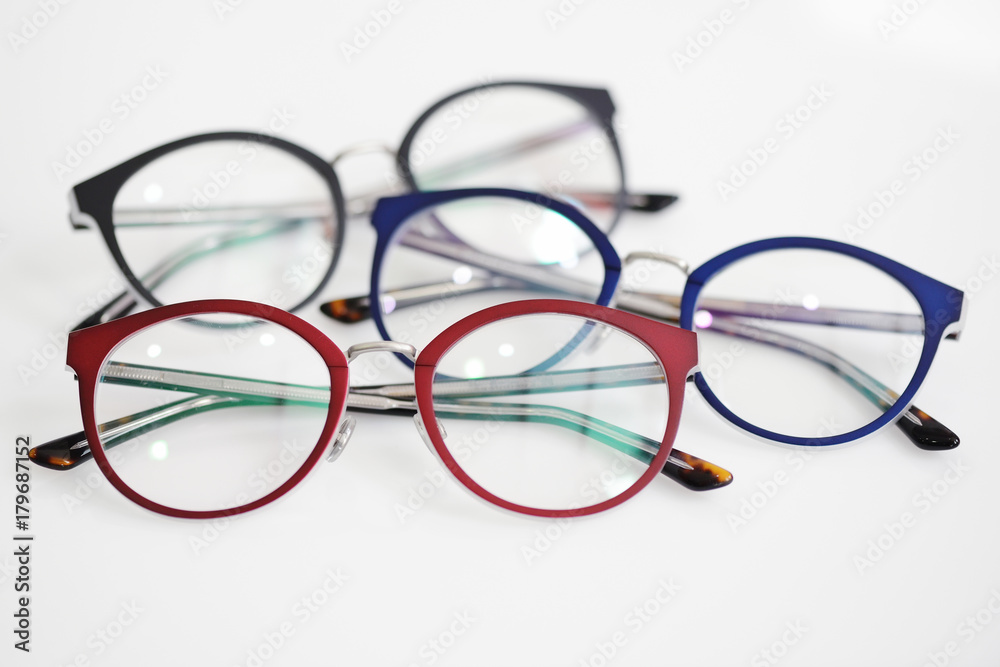 Multicolored glasses on the white background Multicolored glasses on the white background