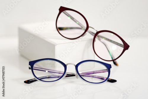 Multicolored fashionable glasses with white case