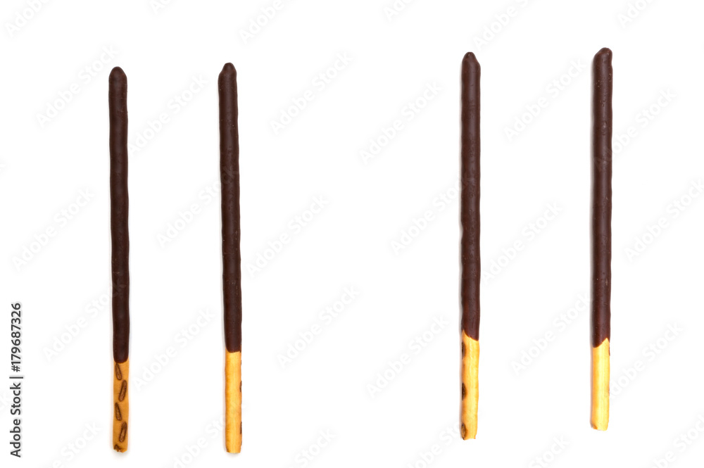 Chocolate Filled Biscuit Sticks on White Background Chocolate Filled Biscuit Sticks on White Background