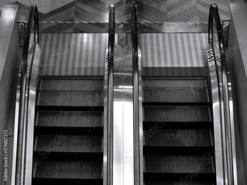 Top view of two way escalator in black and white