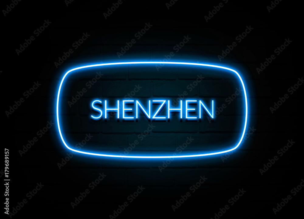 Shenzhen - colorful Neon Sign on brickwall Shenzhen - colorful Neon Sign on brickwall
