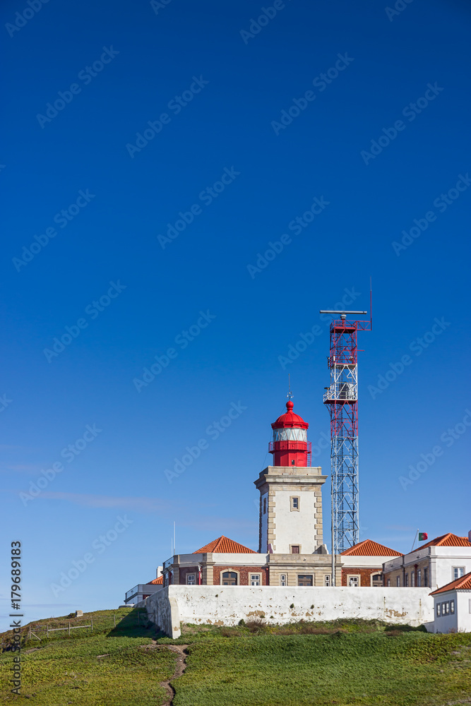 Lighthouse at Cabo da Roca and a beautiful blue sky. Sintra, Portugal