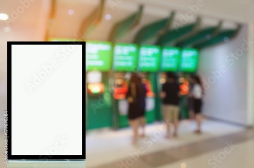 light box or advertising billboard with people doing financial transactions from ATM banking machine at bank, copy space for text or media content, advertisement, commercial and marketing concept