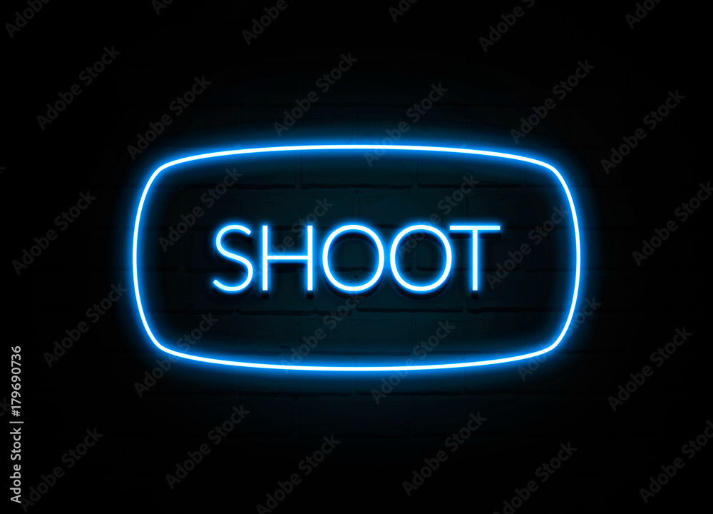 Shoot - colorful Neon Sign on brickwall Shoot - colorful Neon Sign on brickwall