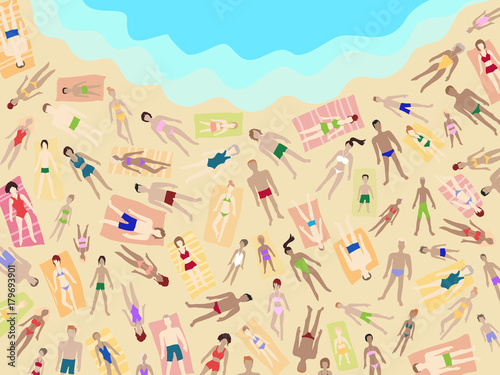 People on the beach, men, women and children lying on the beach 
