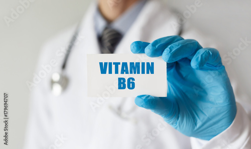 Doctor holding a card with text Vitamin B6,medical concept