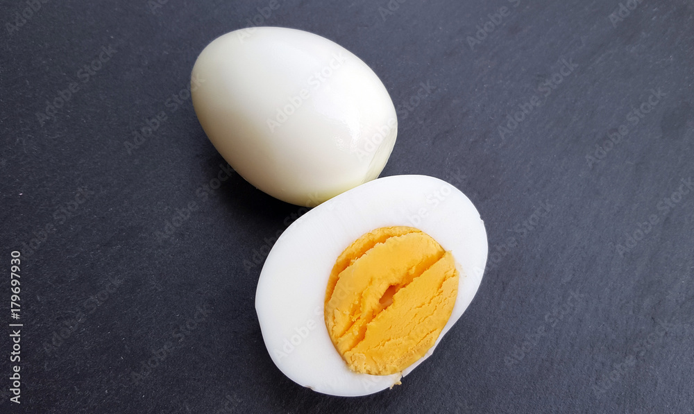 Boiled eggs on dark background close up Boiled eggs on dark background close up