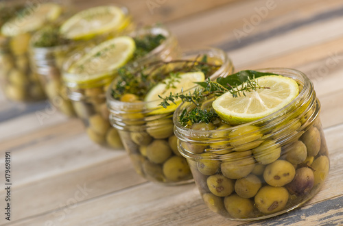 Green olives preserved in jar, preserve photo