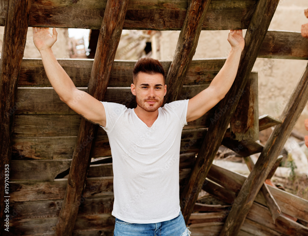 Attractive guy with strong arms