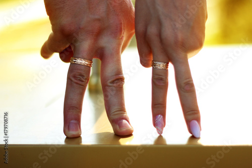 happy couple. Hands of a guy and a girl. bride and groom