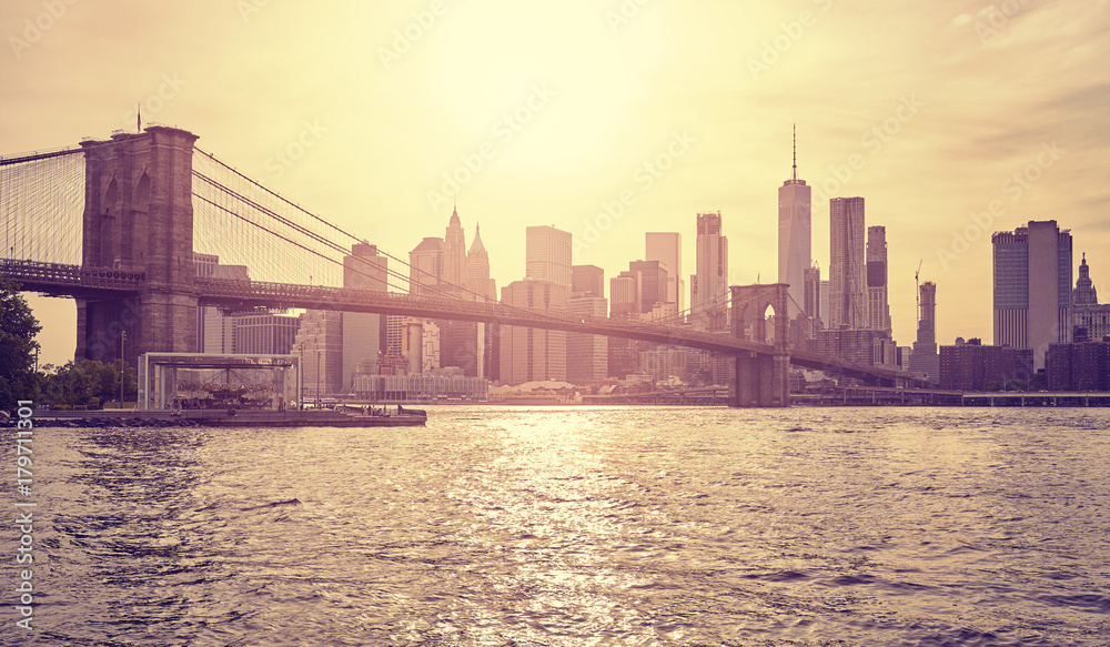 Vintage stylized picture of New York City at sunset, USA.