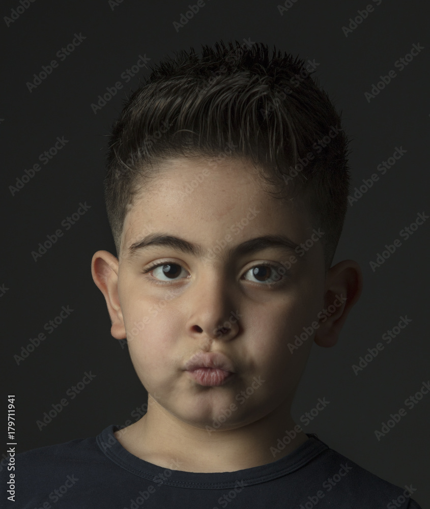 Small boy playing with light Small boy playing with light