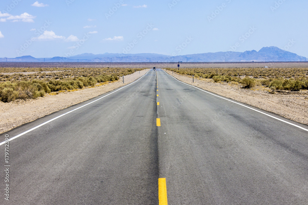 One of the roads that crosses Death Valley National Park, a desert valley located in Eastern California and one of the hottest places in the world