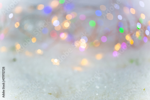 Background for Christmas, with snow and lights photo