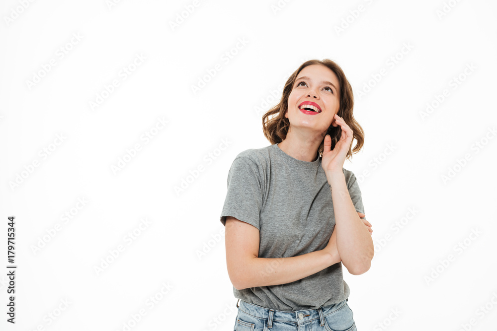 Cheerful young caucasian lady standing isolated Cheerful young caucasian lady standing isolated