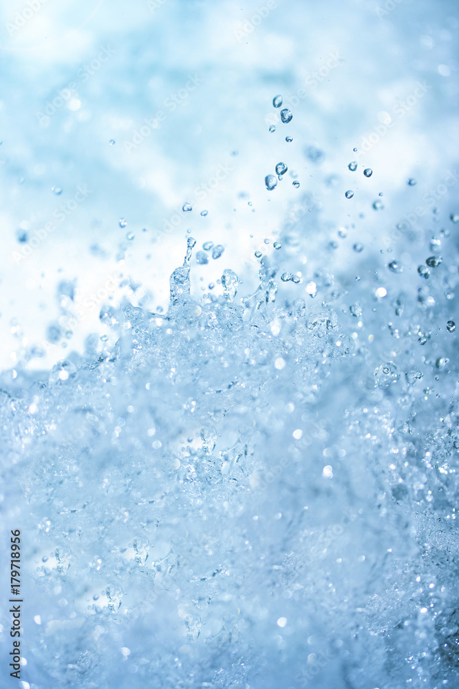 Blue water splash background from nature waterfall in rainforest. Blue water splash background from nature waterfall in rainforest.