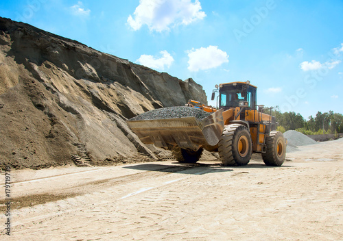 Wheel bulldozer while working.