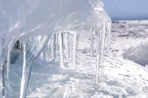 Ice with transparent icicles. Winter time at Lake Baikal © Elena Sistaliuk
