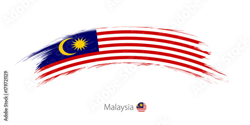 Flag of Malaysia in rounded grunge brush stroke.