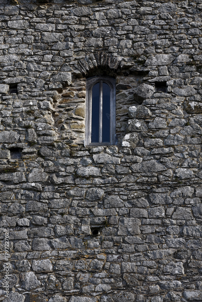 Old window in a stone building