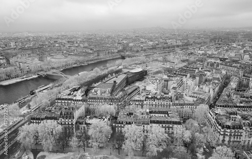 Infrared aerial view of Paris skyline and Seine river from the top of Eiffel Tower - France © jovannig
