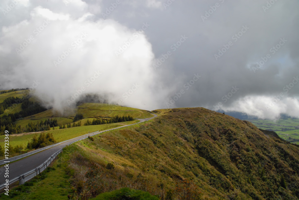 Clouds are covering Miradouro do Salto do Cavalo in Sao Miguel, Azores, Portugal