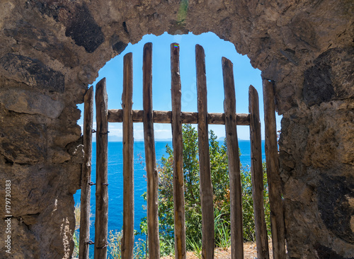 A summer day visiting Aragonese Castle and looking toward Capri and Vesuvi Ischia Ponte, Ischia, Phlegrean Islands, Tyrrhenian Sea, Italy, South Europe photo